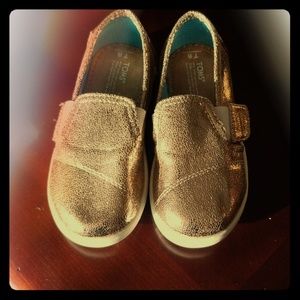 Tom's gold sparkle slip on shoes
